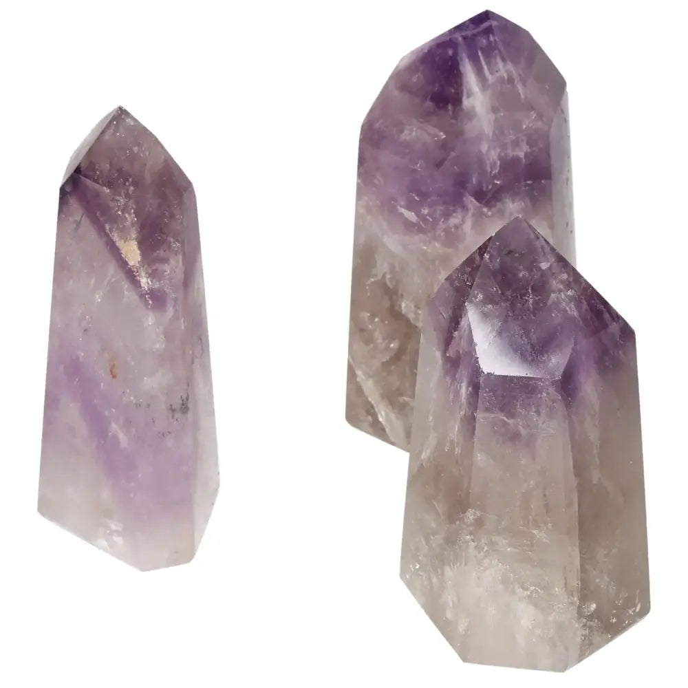Polished Point Amethyst L crystals by Sylvia Crystals showcasing premium craftsmanship and serene energy for stress reduction.