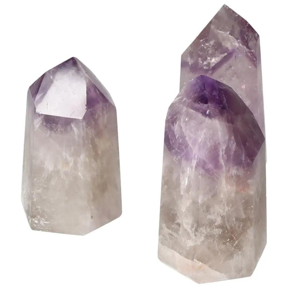Polished Point Amethyst L crystals from Sylvia Crystals showcasing premium craftsmanship and serene, stress-reducing qualities.