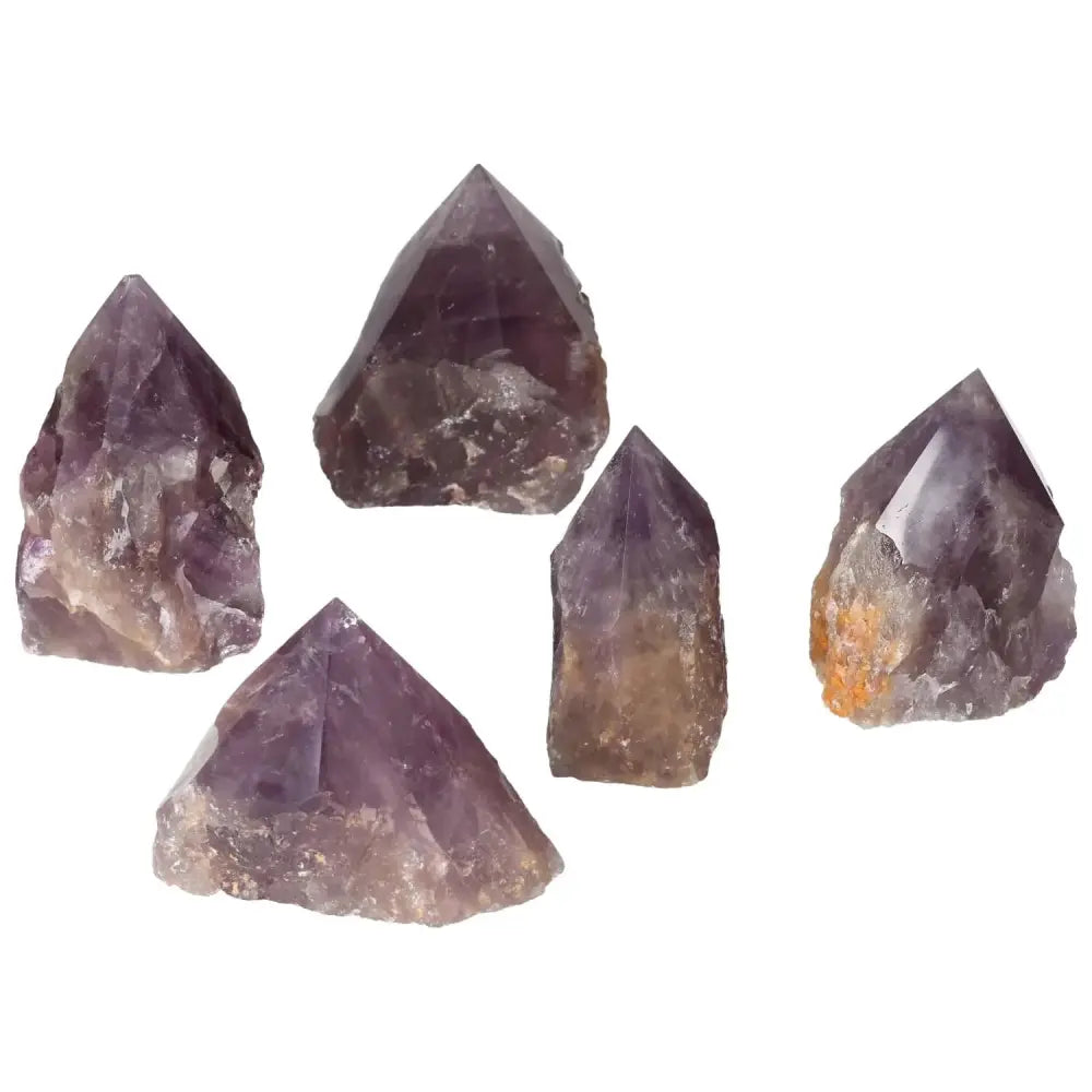 Polished Point Amethyst L crystals for stress reduction by Sylvia Crystals, featuring premium quality and energy-enhancing properties.