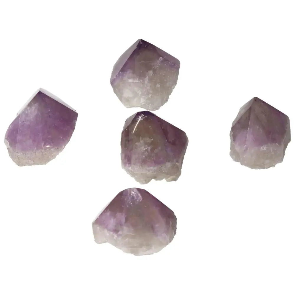 Polished Point Amethyst M crystals displaying mesmerizing purple hues, crafted by Sylvia Crystals for spiritual elegance and mindful living.