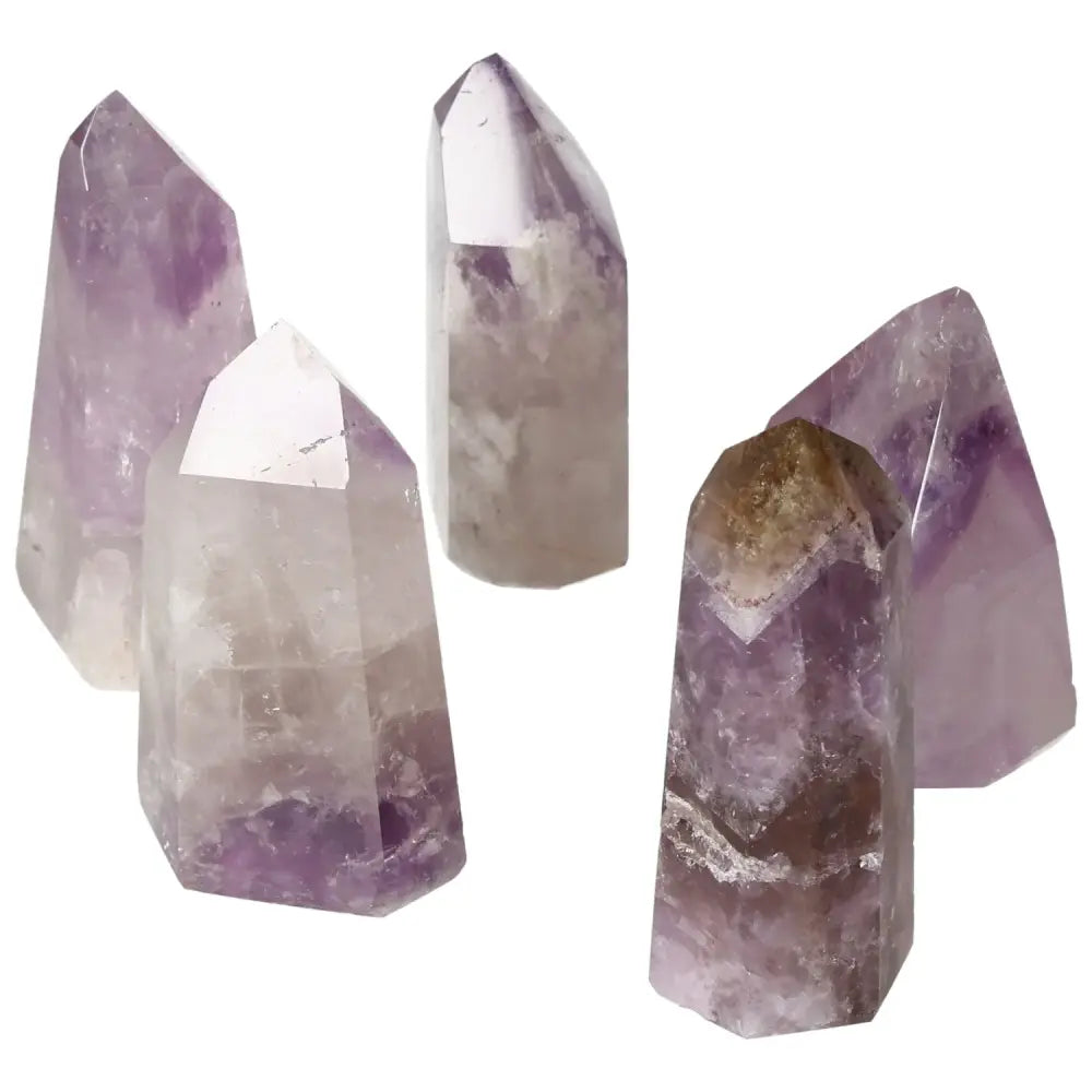 Polished Point Amethyst M crystals by Sylvia Crystals, promoting tranquility and mental clarity with elegant design.