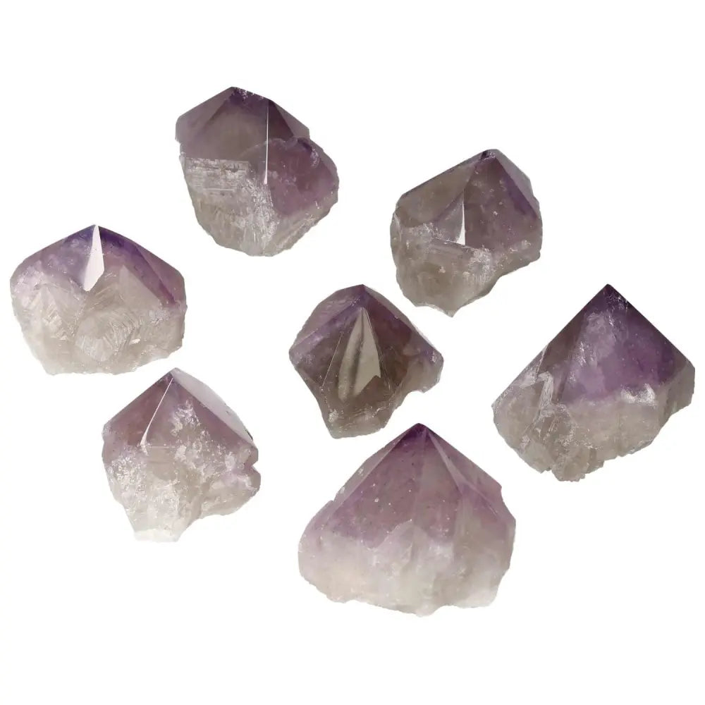 Polished Point Amethyst S collection showcasing elegant, handpicked crystals known for calming and enhancing concentration.