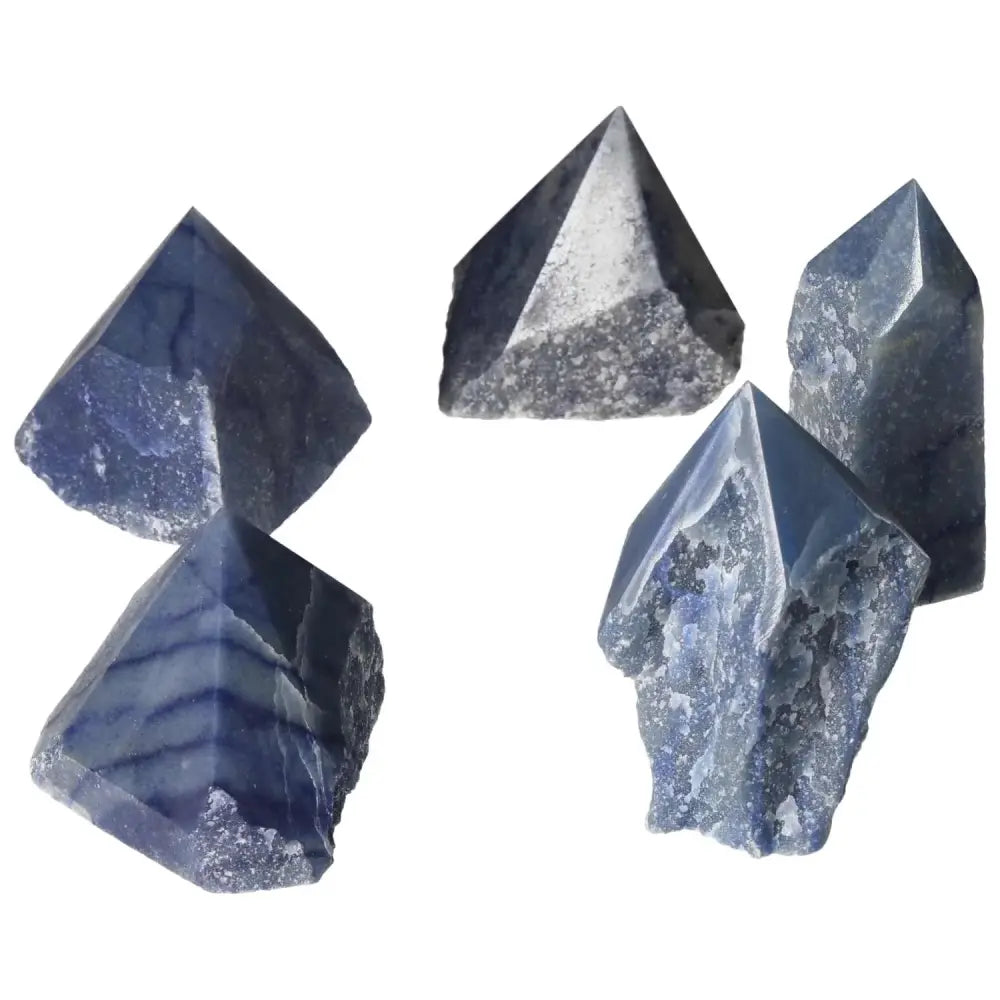 Polished Point Blue Quartz M crystals display, premium quality, luxurious blue-hued stones for spiritual and emotional well-being by Sylvia Crystals.