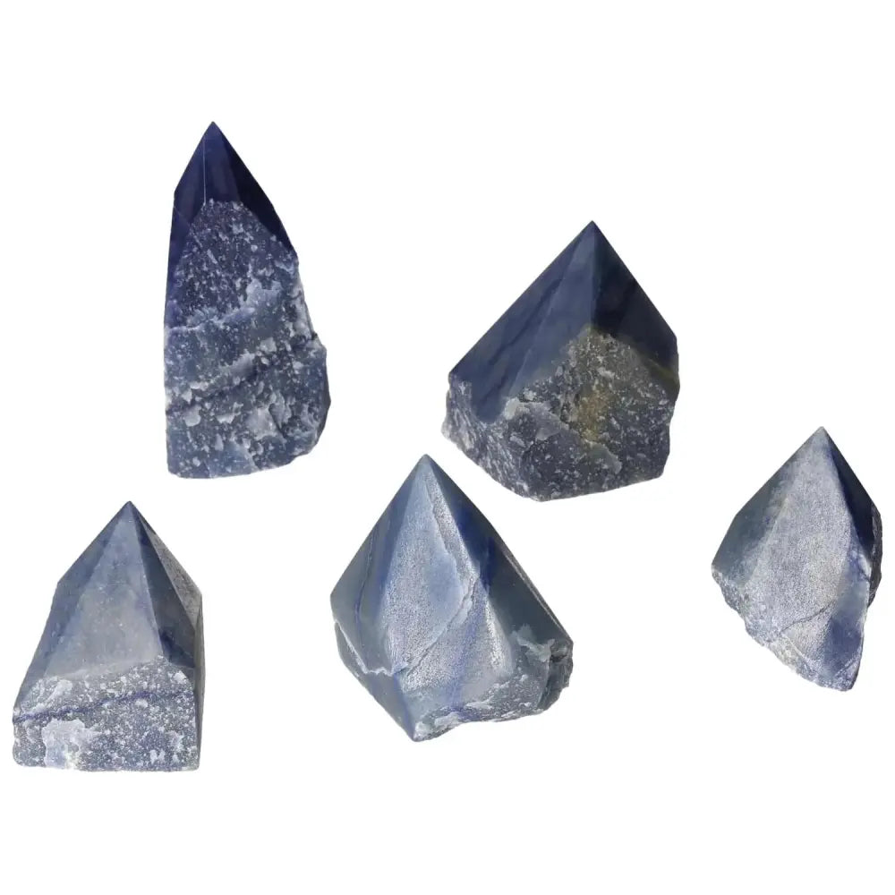 Collection of Polished Point Blue Quartz S crystals from Sylvia Crystals, showcasing natural beauty and unique shapes for peace and clarity.