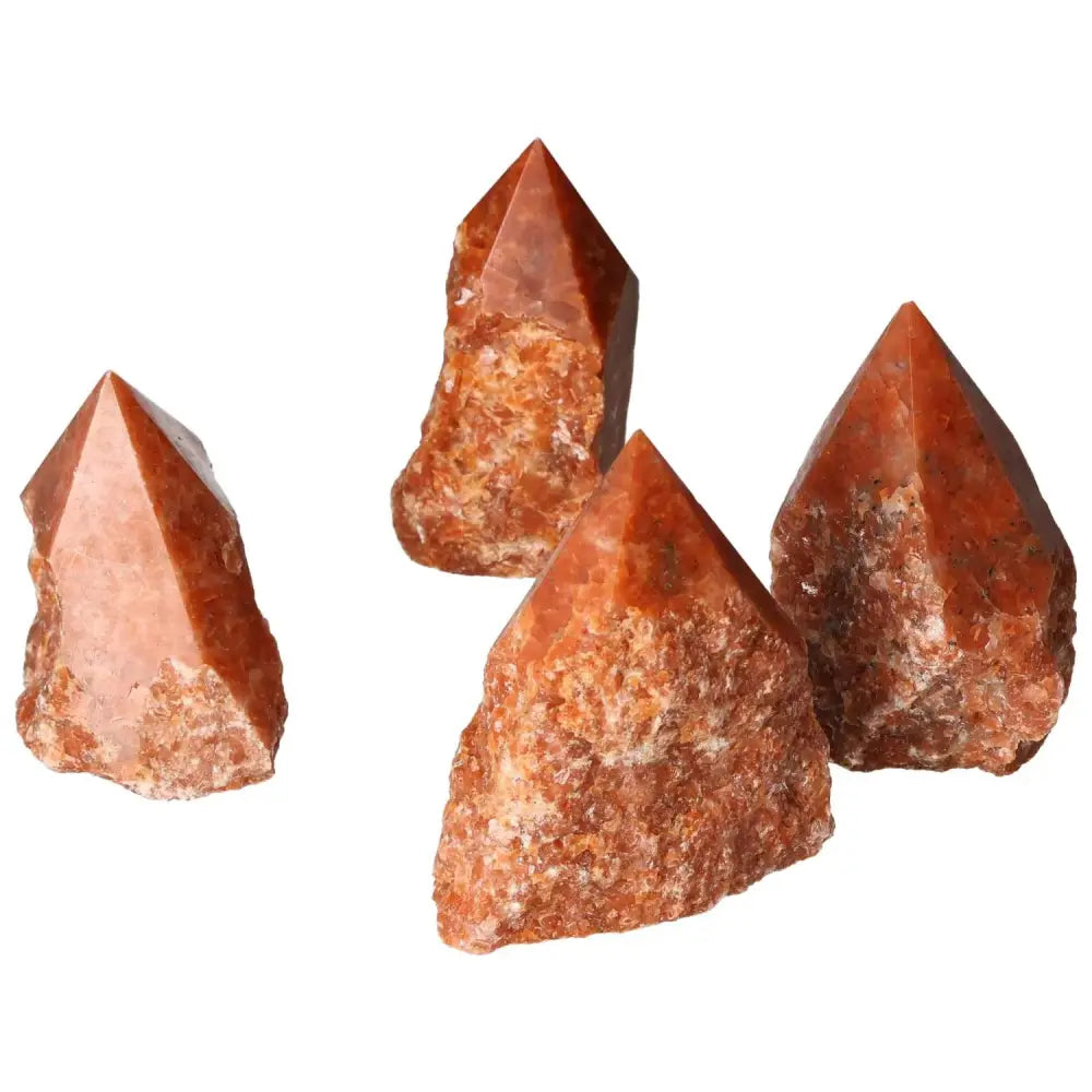 Polished Point Calcite L crystals in vibrant orange and red hues from Sylvia Crystals, symbolizing energy and transformation.