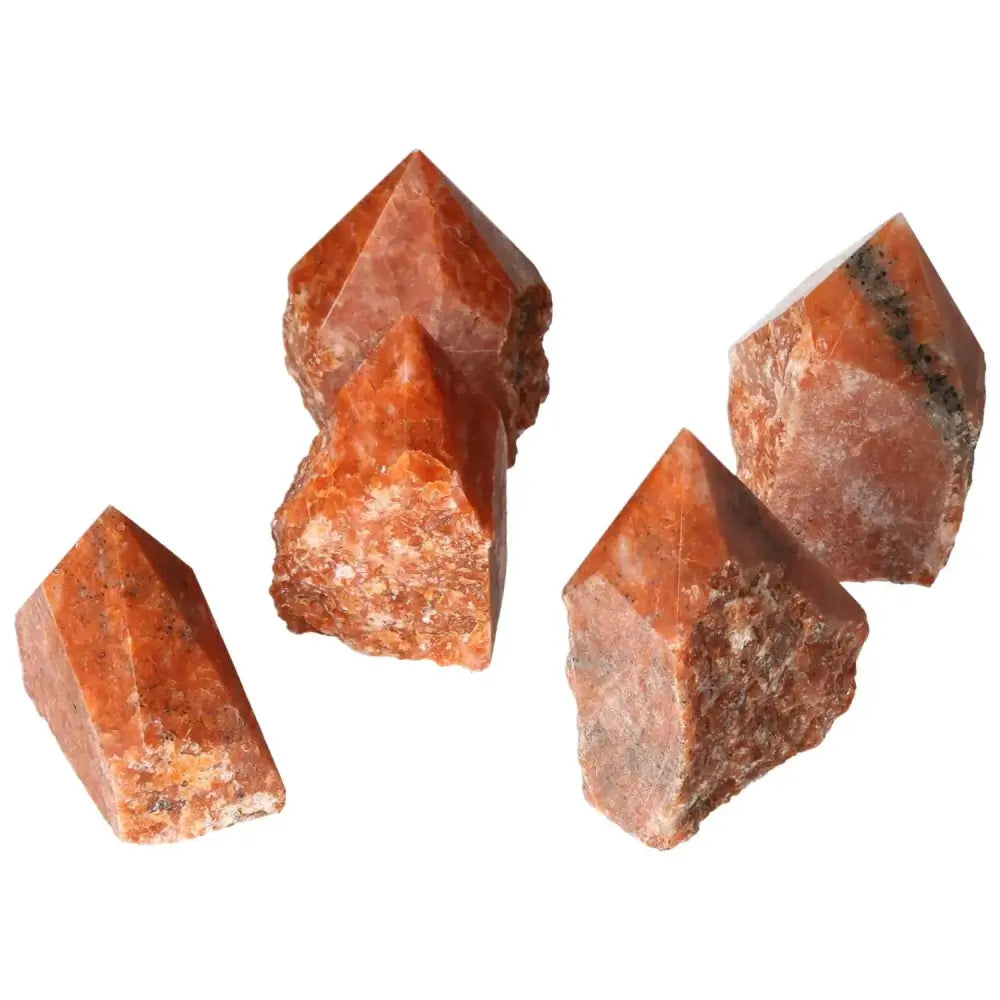 Polished Point Calcite M from Sylvia Crystals with fiery tones symbolizing willpower and transformation.