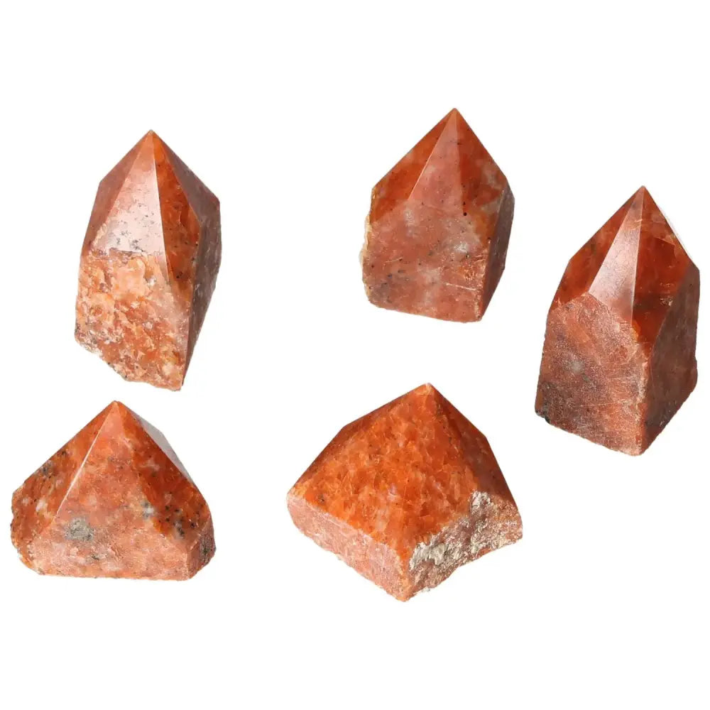 Polished Point Calcite S crystals with vibrant hues symbolizing willpower and creativity, ideal for boosting self-confidence.