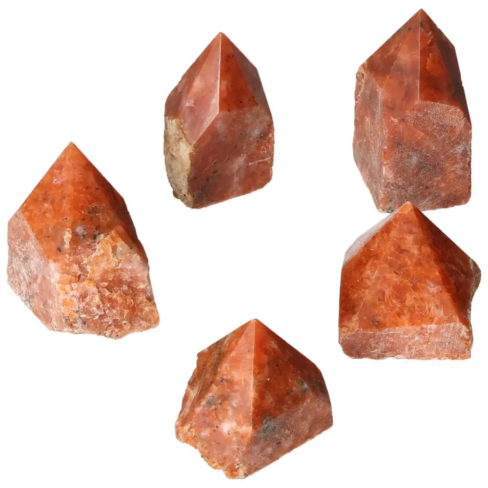 Polished Point Calcite S crystals by Sylvia Crystals, symbolizing willpower, determination, and creativity with vibrant hues.
