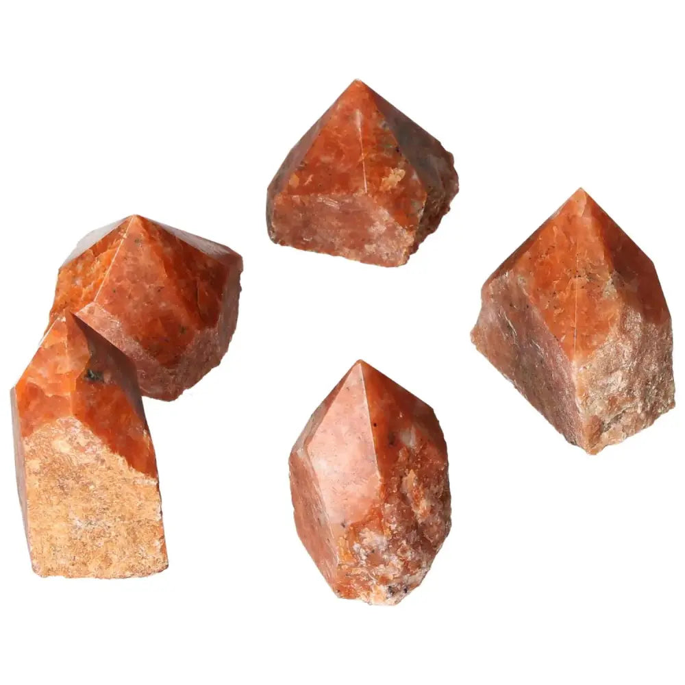 Vibrant Polished Point Calcite S crystals from Sylvia Crystals symbolizing willpower and creativity. Boost self-confidence and determination.