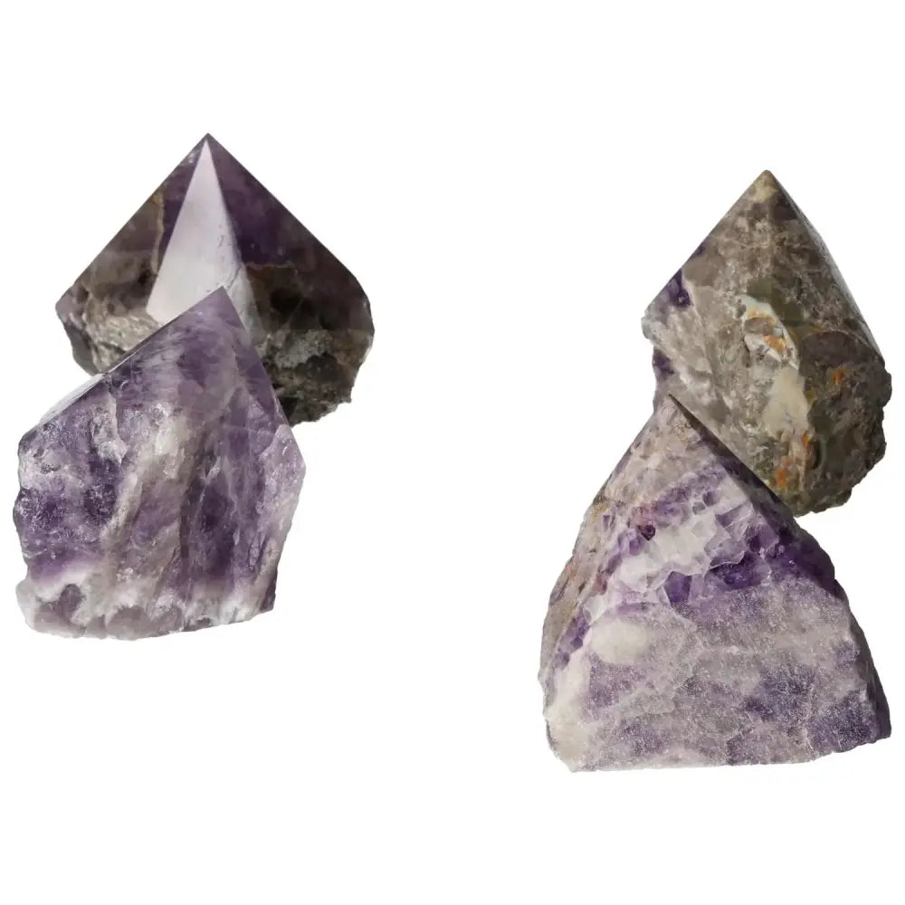 Polished Point Chevron Amethyst L crystals showcasing their vibrant purple hues and natural formations.