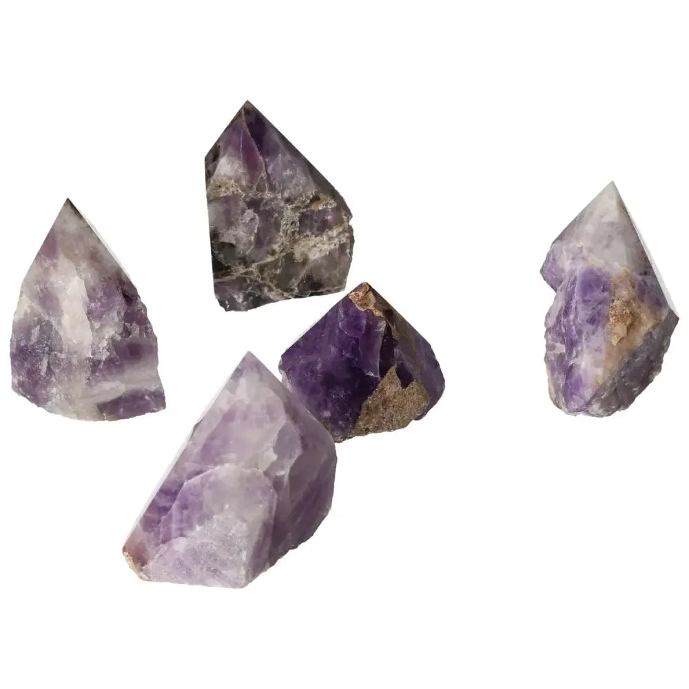 Polished Point Chevron Amethyst M gemstones with natural patterns, embodying balance and tranquility, from Sylvia Crystals.
