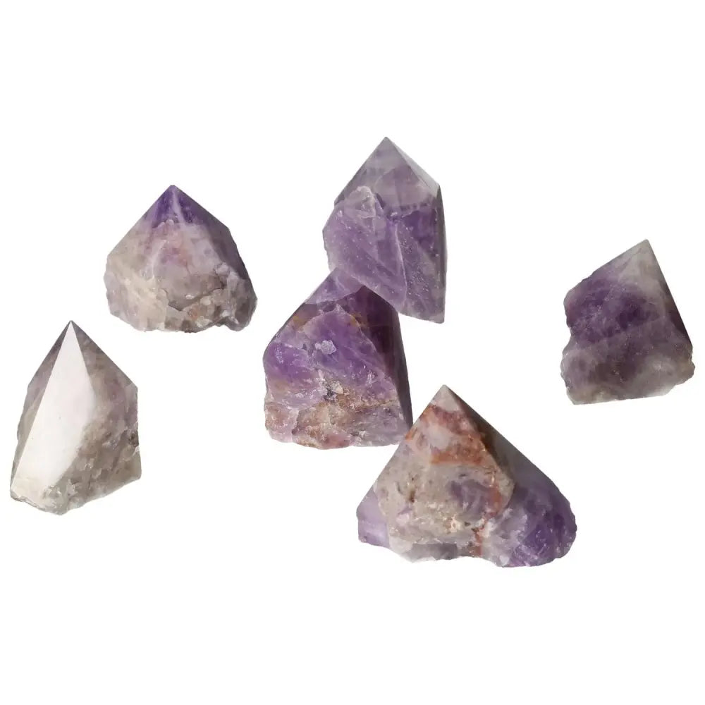 Polished Point Chevron Amethyst gemstones showcasing unique purple and white patterns, ideal for energy healing and luxury collections.