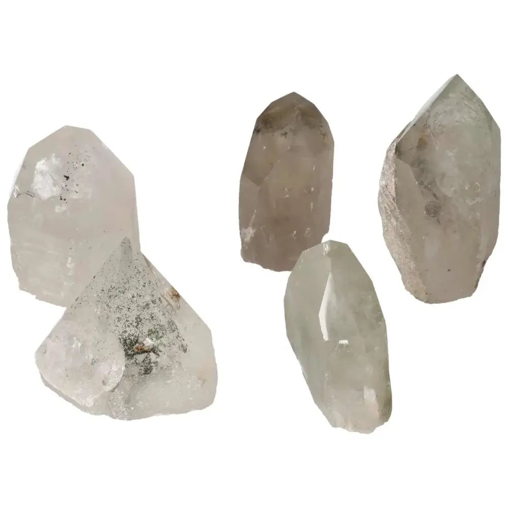 Five polished clear quartz point crystals with chlorite accents, ideal for spiritual luxury and purification. Sylvia Crystals collection.