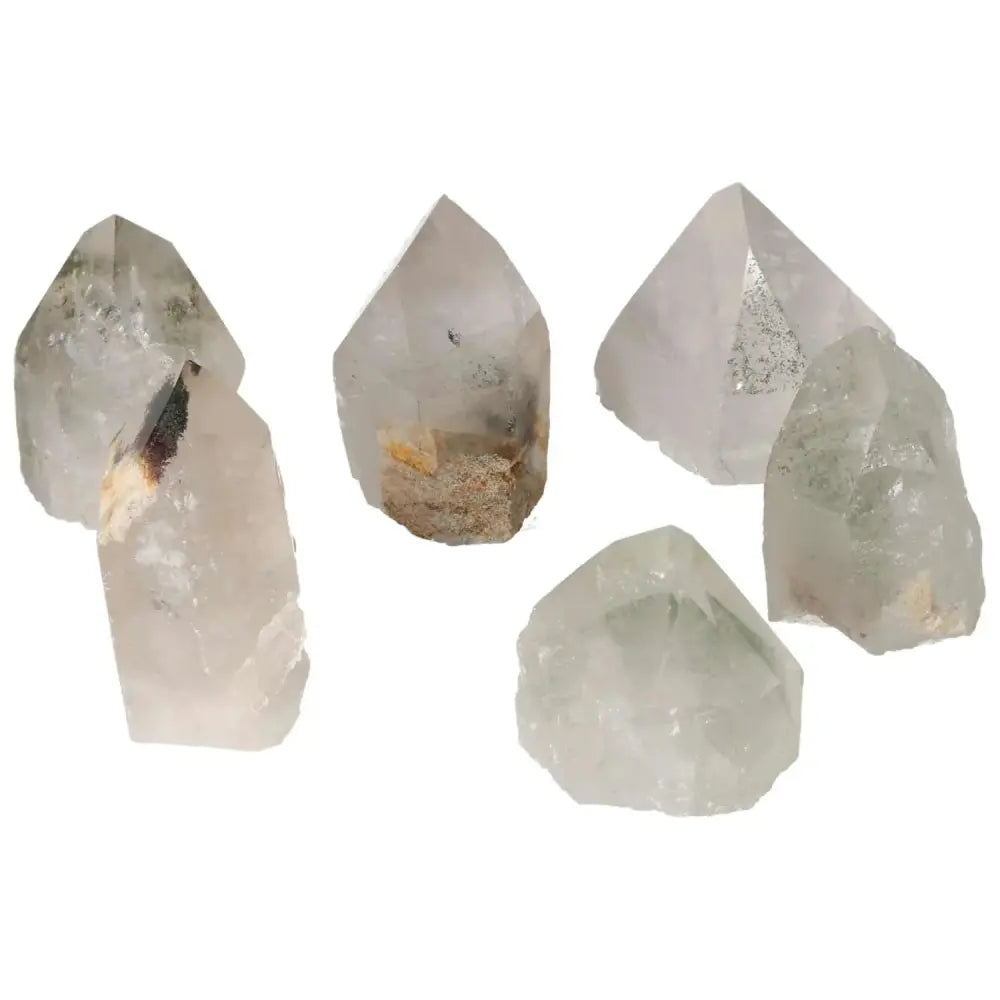 Collection of Polished Point Clear Quartz with Chlorite Crystals, harmonizing body and mind with unique energy-enhancing properties.