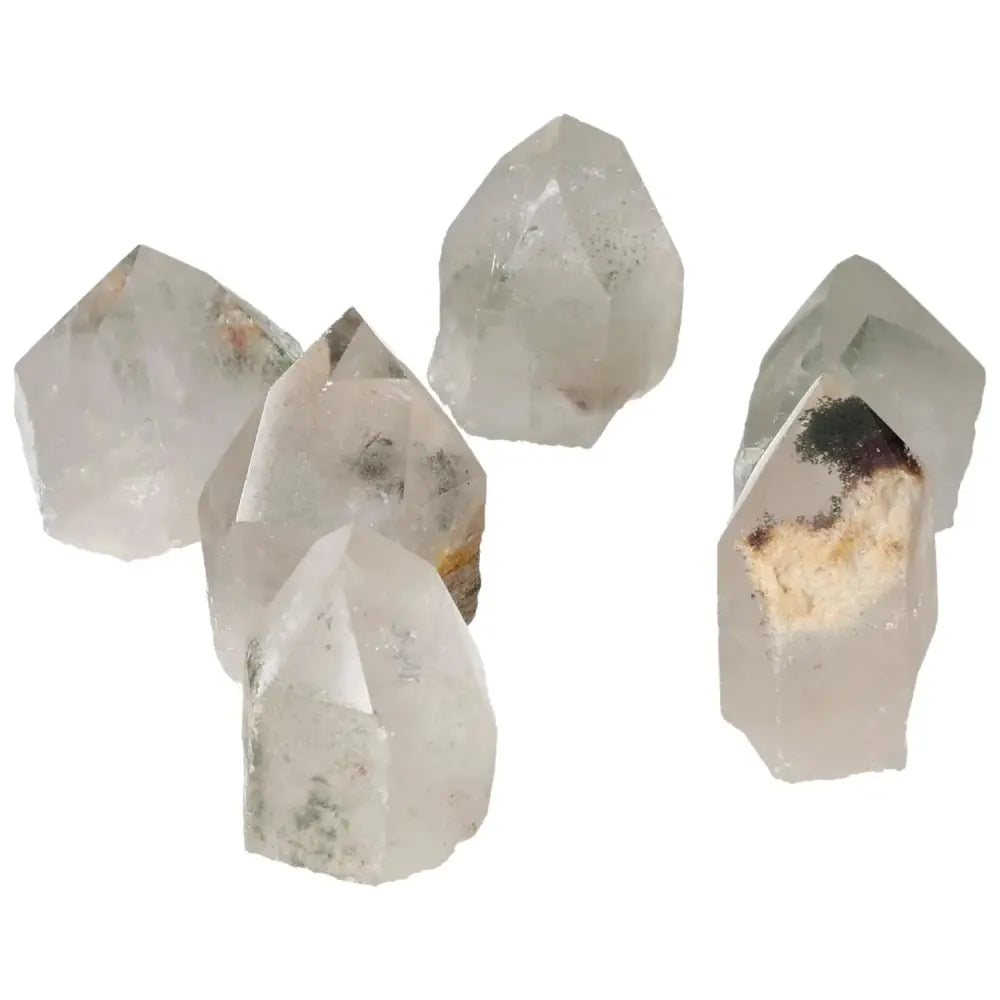 Polished Point Clear Quartz with Chlorite S stones showcasing spiritual purity and energy enhancement by Sylvia Crystals.