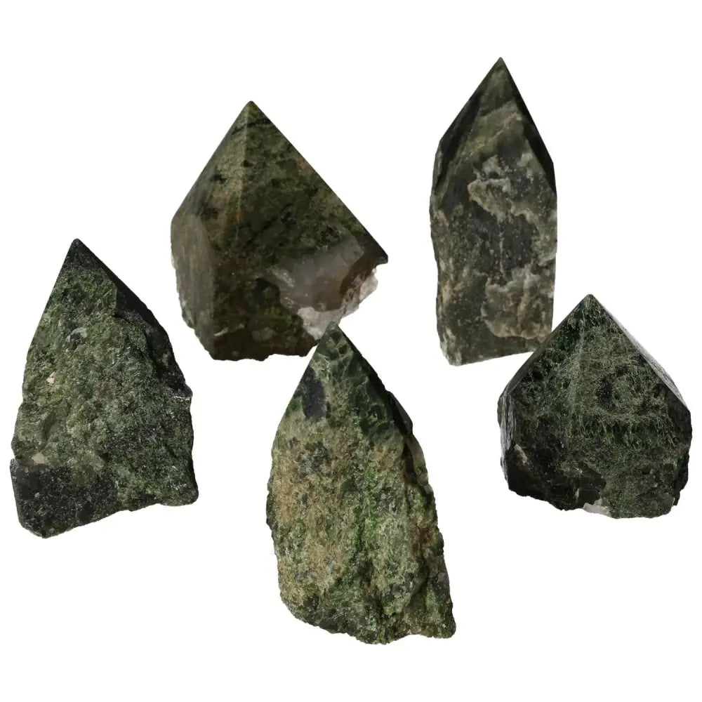 Five polished point diopside gemstones from Sylvia Crystals, featuring rich green hues and transformative healing properties.
