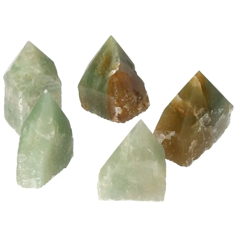 Collection of polished green quartz points with hematite inclusions from Sylvia Crystals, showcasing premium quality gemstones.