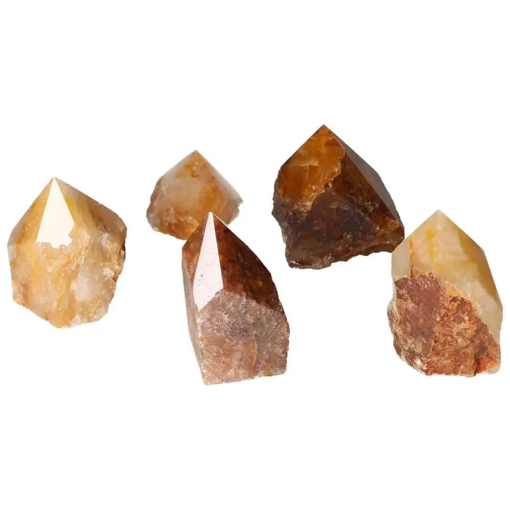 Polished Point Hematoide crystals showcasing transcendent beauty and unique energy for enhanced spiritual practice.