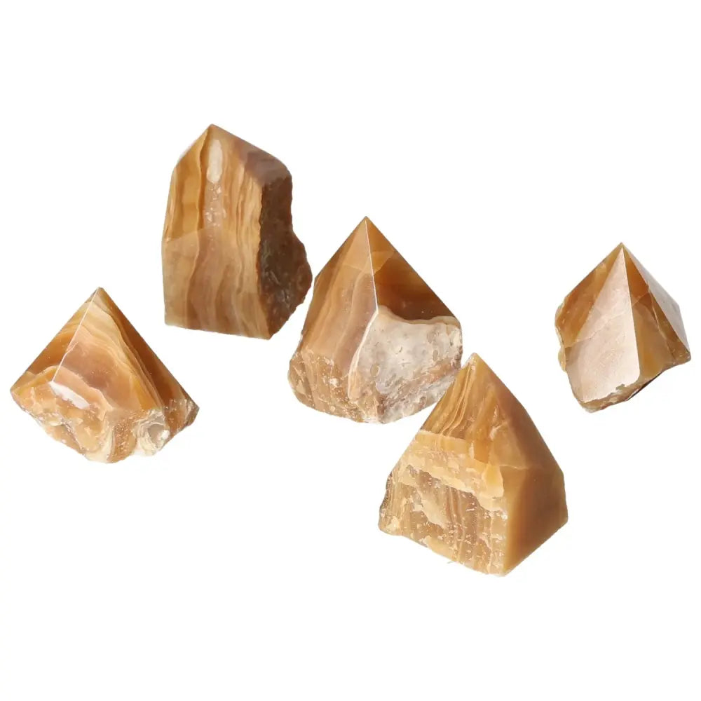 Polished Point Honey Calcite crystals symbolizing abundance and success, reflecting a rich honey hue.