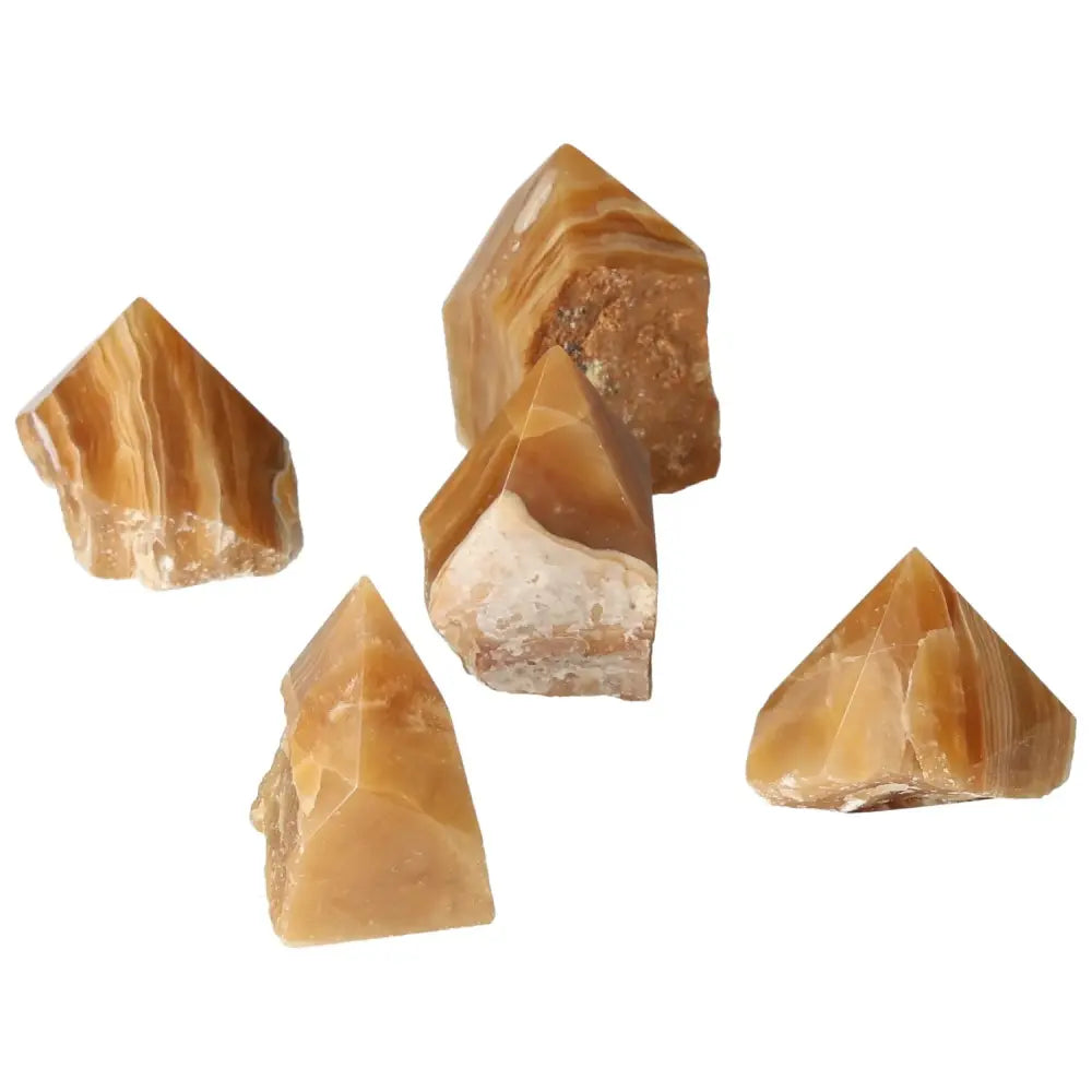 Polished Point Honey Calcite crystals symbolizing prosperity and abundance, ideal for enhancing positive energy and success.