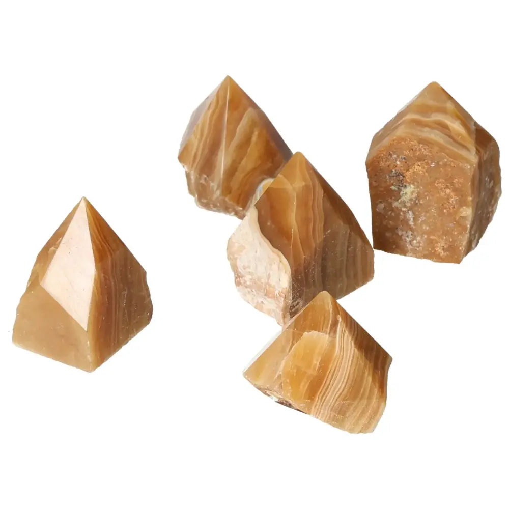 Polished Point Honey Calcite crystals symbolizing abundance and prosperity, perfect for manifesting success and uplifting energy.