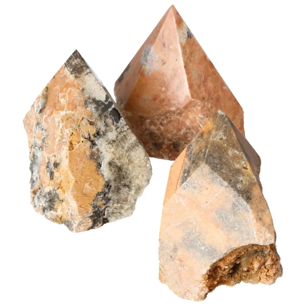 Polished Point Orquidea Calcite L gemstones from Sylvia Crystals, showcasing unique patterns and elegance. Ideal for decor and energy elevation.