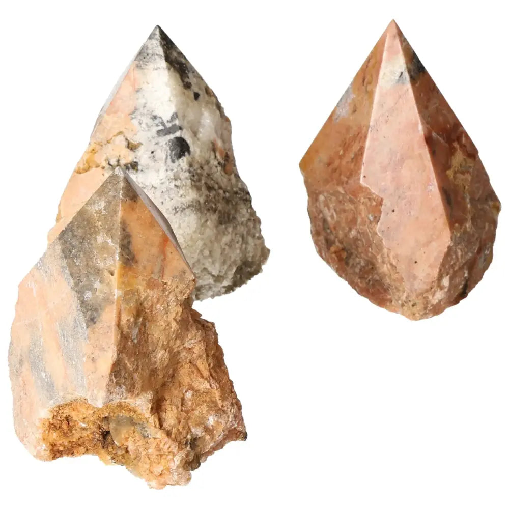 Three polished Orquidea Calcite points showcasing unique patterns and colors, enhancing decor and spiritual energy.