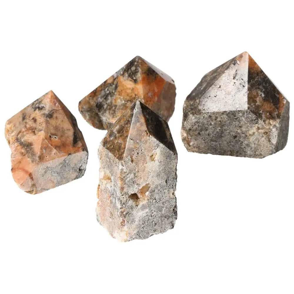 Polished Point Orquidea Calcite M crystals by Sylvia Crystals, ideal for boosting self-confidence and ambition.