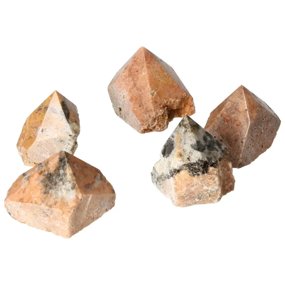 Group of polished Orquidea Calcite points showcasing natural patterns and enhancing personal growth and success.