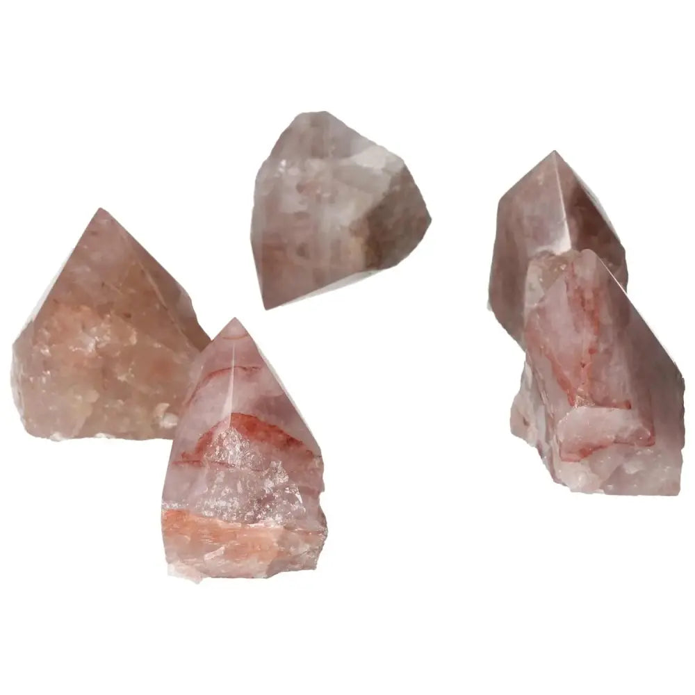 Polished Point Pink Hematoide S gemstones from Sylvia Crystals, showcasing radiant pink tones and exceptional craftsmanship.