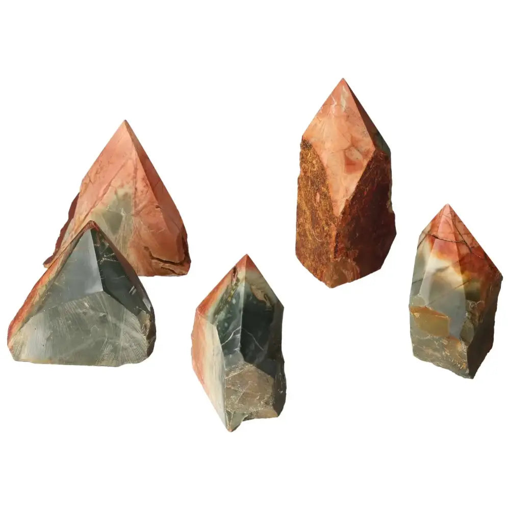 Collection of five polished Polychrome Jasper points, showcasing vibrant colors and unique banded patterns, by Sylvia Crystals.