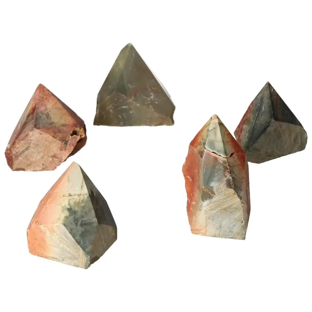Polished Polychrome Jasper points showcasing vibrant reds, oranges, and browns from Sylvia Crystals, known for spiritual enrichment.