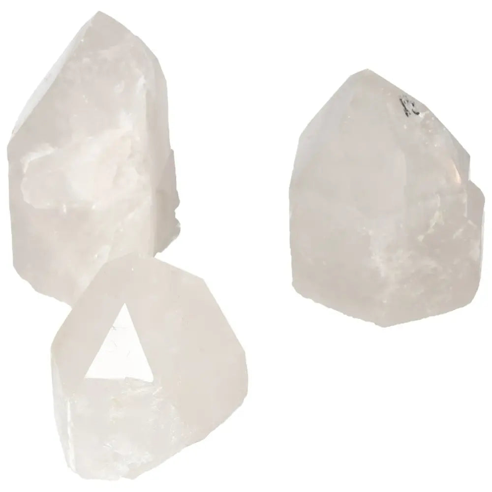 Polished Point Quartz L crystals from Sylvia Crystals, known for harmonizing mind, body, and spirit, enhancing spiritual transformation.