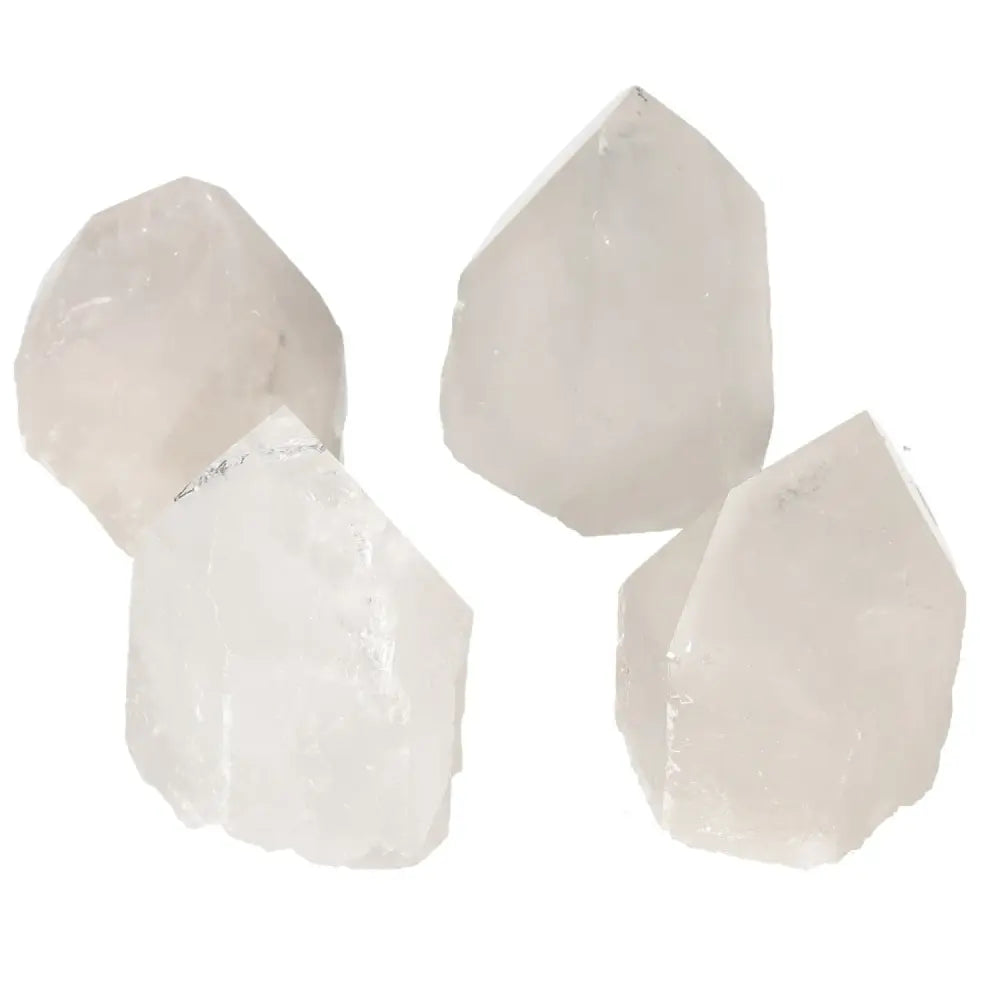 Polished Point Quartz M crystals by Sylvia Crystals, luxury spiritual tool for chakra alignment and energy enhancement.