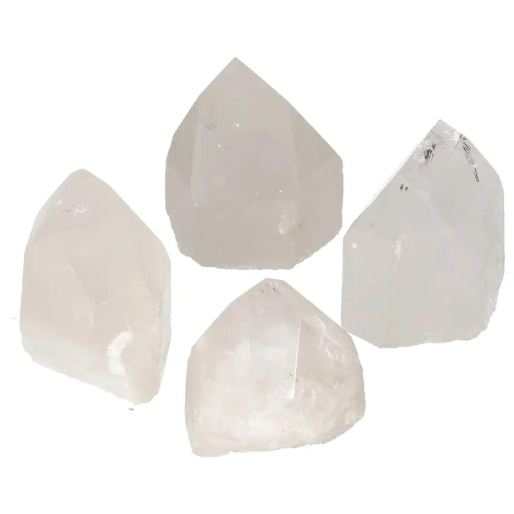 Collection of Polished Point Quartz M crystals by Sylvia Crystals, renowned for energy alignment and chakra connection.