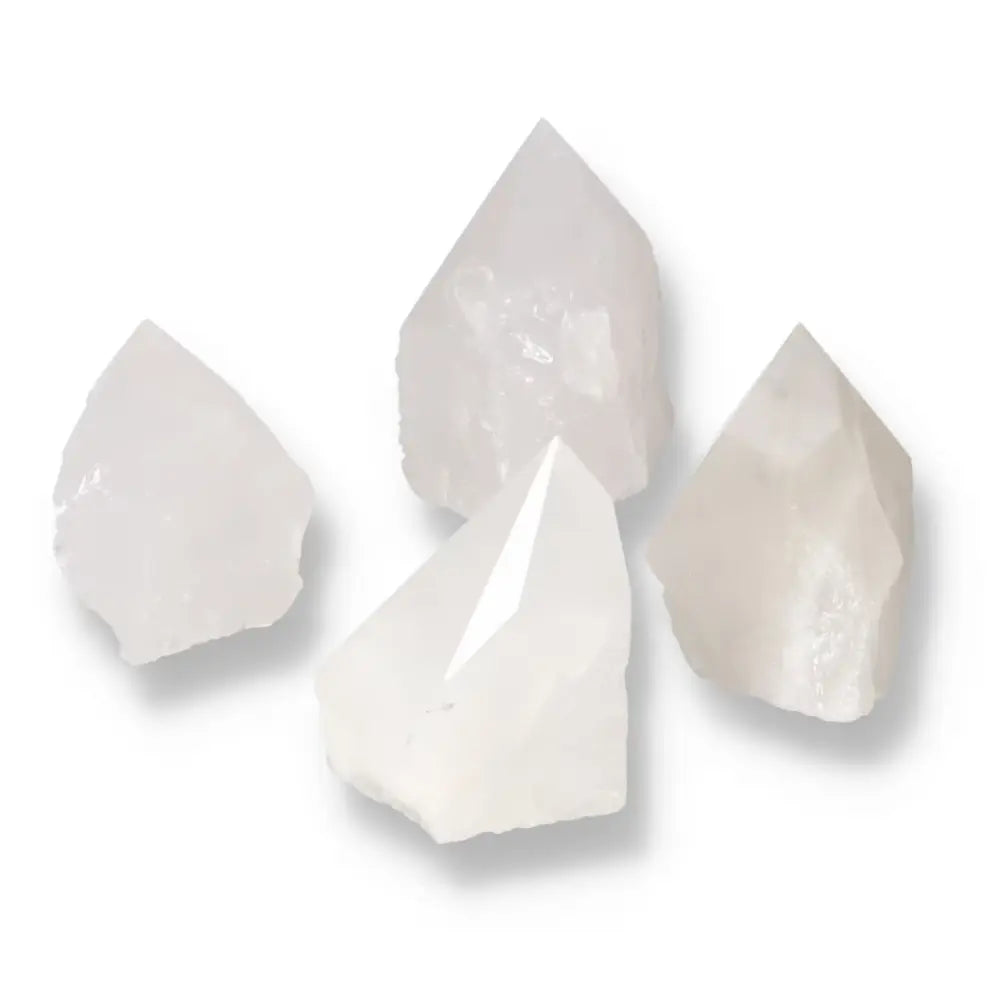 Polished Point Quartz M from Sylvia Crystals, featuring four clear quartz crystals for purity and harmony.
