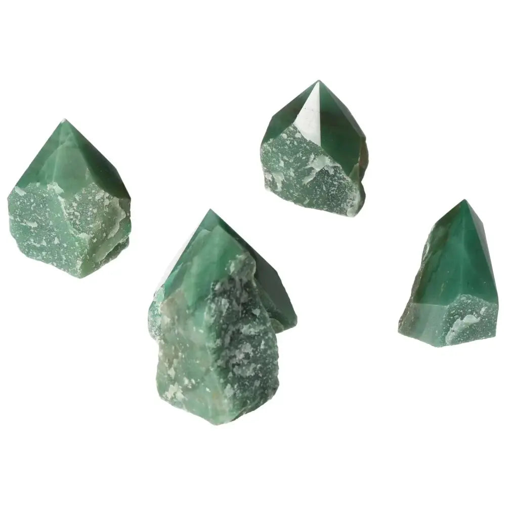 Green polished point quartz crystals from Sylvia Crystals, showcasing clarity and brilliance, ideal for sophisticated decor.