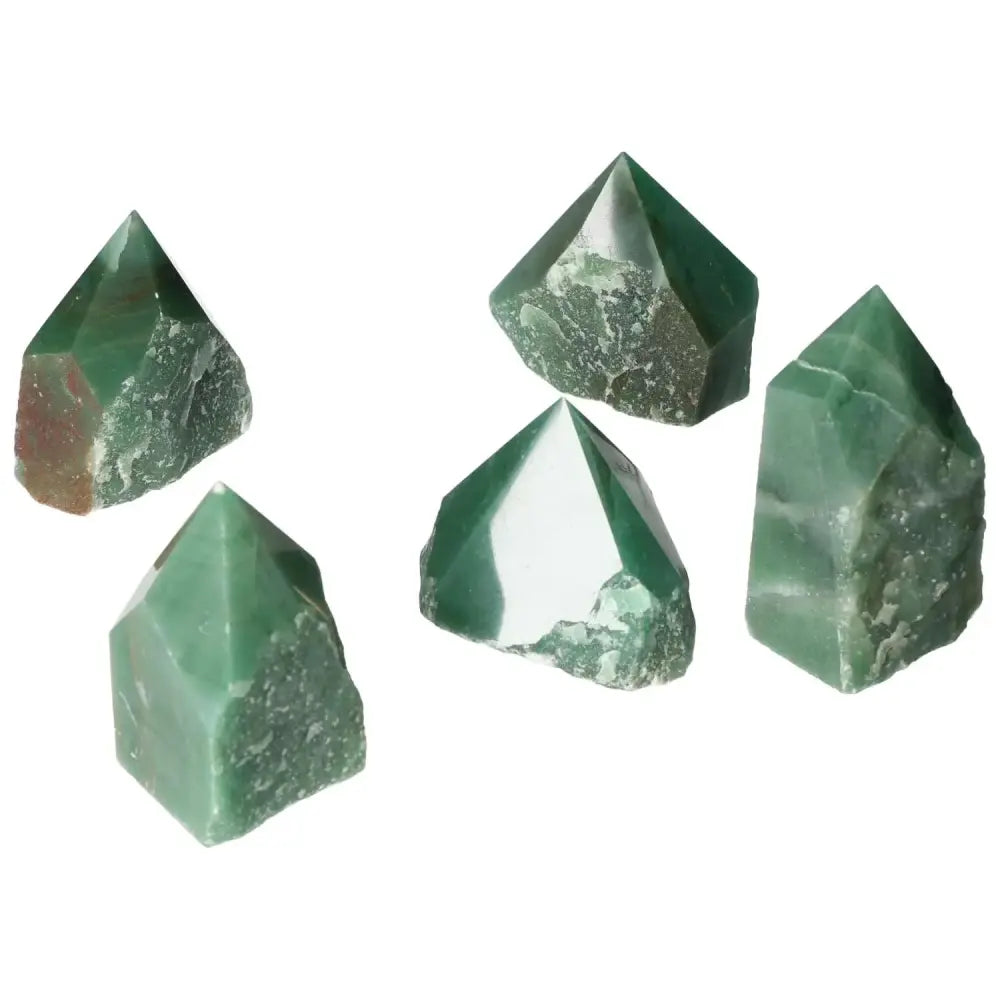 Green polished quartz points from Sylvia Crystals, showcasing exceptional clarity and brilliance, ideal for decor and collection.