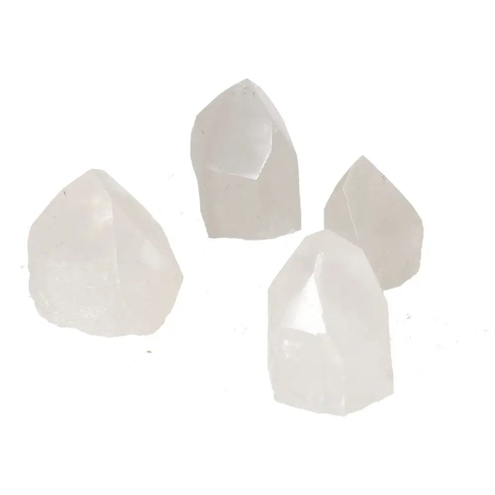Polished Point Quartz S pieces from Sylvia Crystals, showcasing elegance and energy amplification, perfect for enhancing any space.