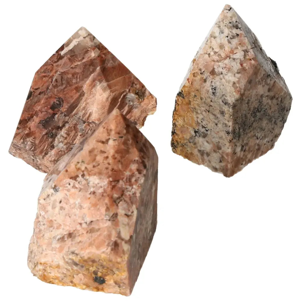 Polished Point Quartz with Feldspar showcasing luxury and natural beauty from Sylvia Crystals.