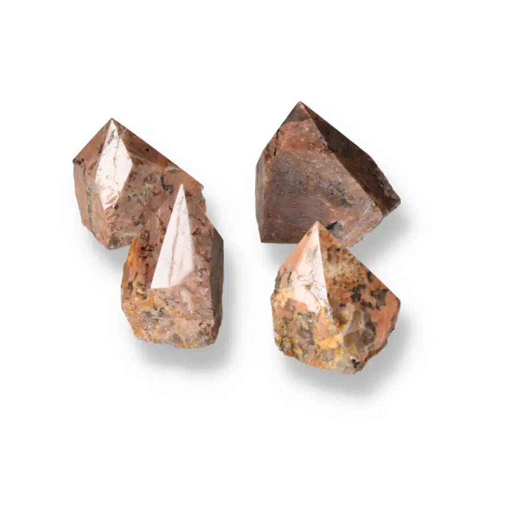 Polished Point Quartz With Feldspar M crystals showcasing unique handpicked design by Sylvia Crystals for balance and clarity.