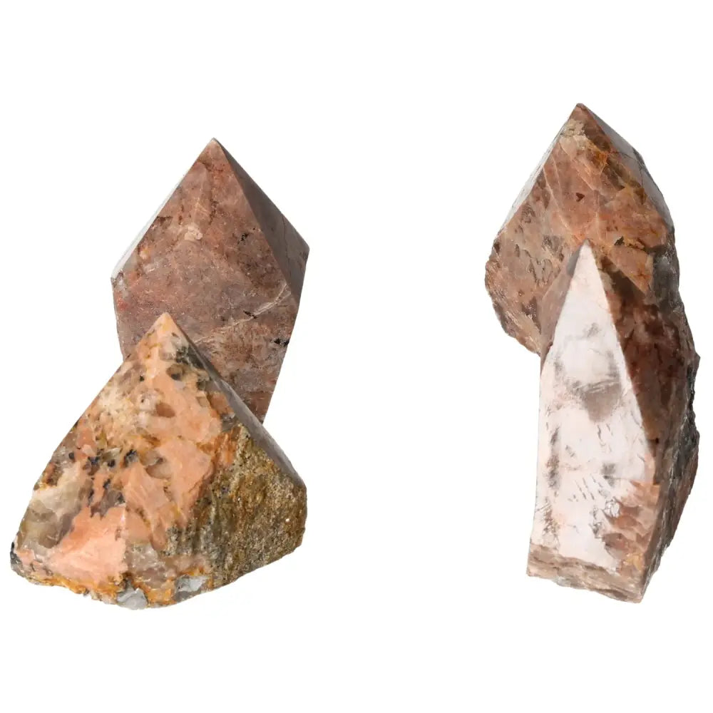 Polished point quartz with feldspar crystal by Sylvia Crystals, offering clarity, energy amplification, and grounding balance.