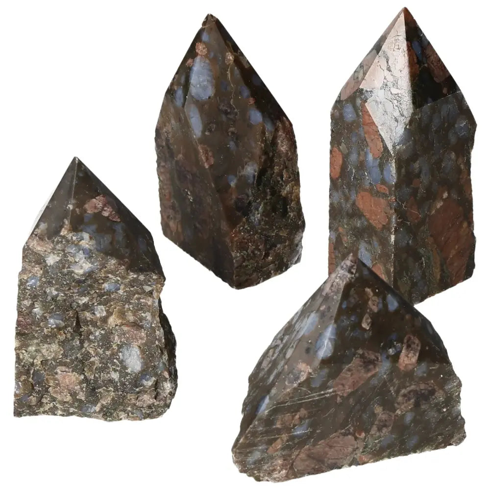 Four polished point Rhyolite M crystals featuring unique speckles and banding in shades of pink, green, brown, and gray.