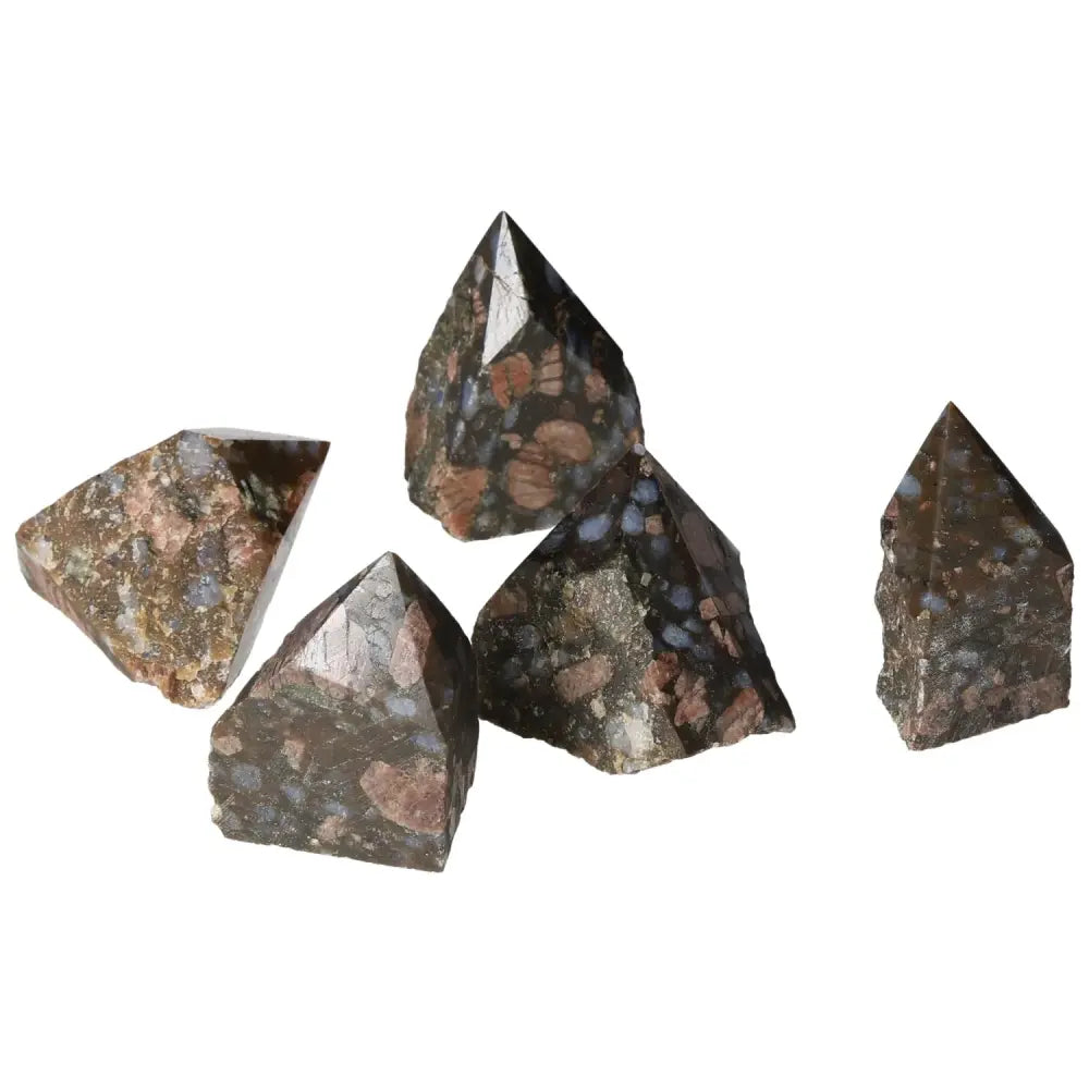 Polished Point Rhyolite S crystals showcasing pink, green, brown, and gray hues, crafted from volcanic igneous rock by Sylvia Crystals.
