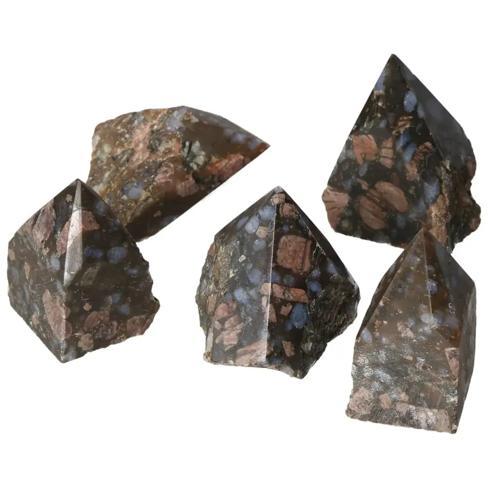 Collection of Polished Point Rhyolite S stones with vibrant pink, green, brown, and gray hues, showcasing natural elegance.
