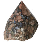 Polished Point Rhyolite crystal with vibrant pink, green, brown, and gray hues, featuring natural speckles and banding.