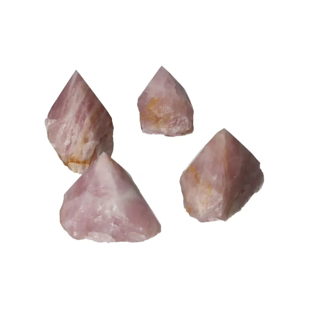 Polished Point Rose Quartz L gemstones emitting gentle, healing energy, perfect for fostering love and enhancing relationships.