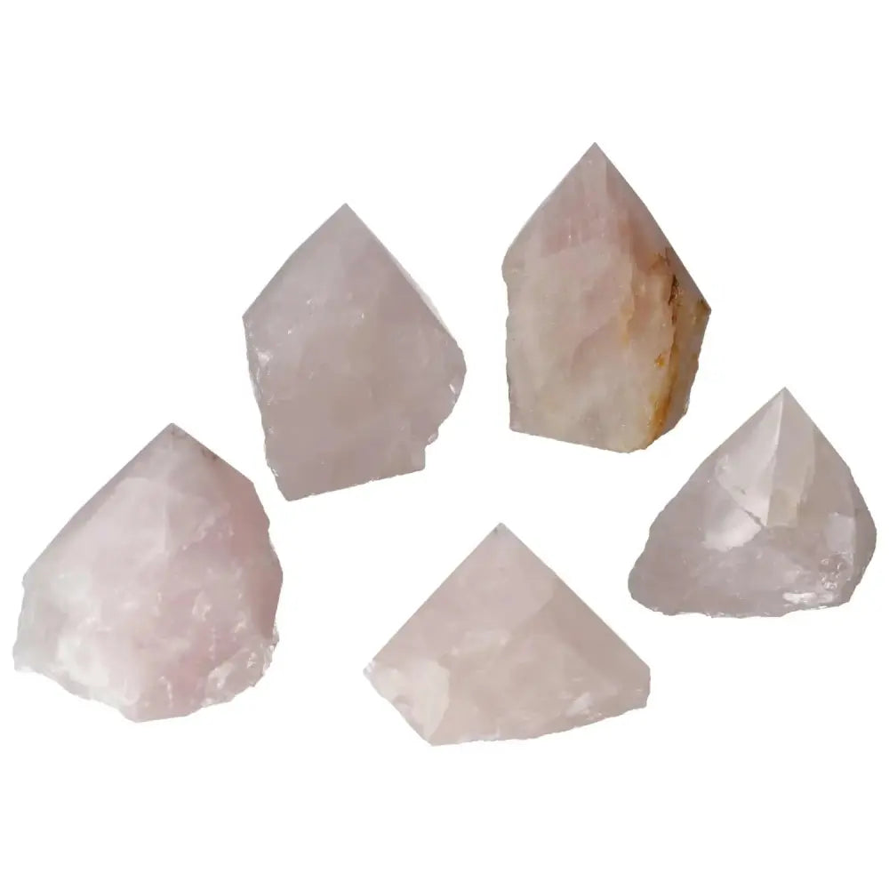 Elegant polished point rose quartz L crystals from Sylvia Crystals, enhancing spiritual tranquility and luxury in any space.