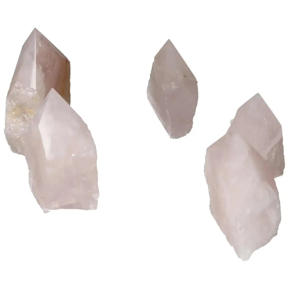 Cluster of polished point rose quartz crystals, showcasing premium quality and luxury from Sylvia Crystals, ideal for elegance and tranquility.