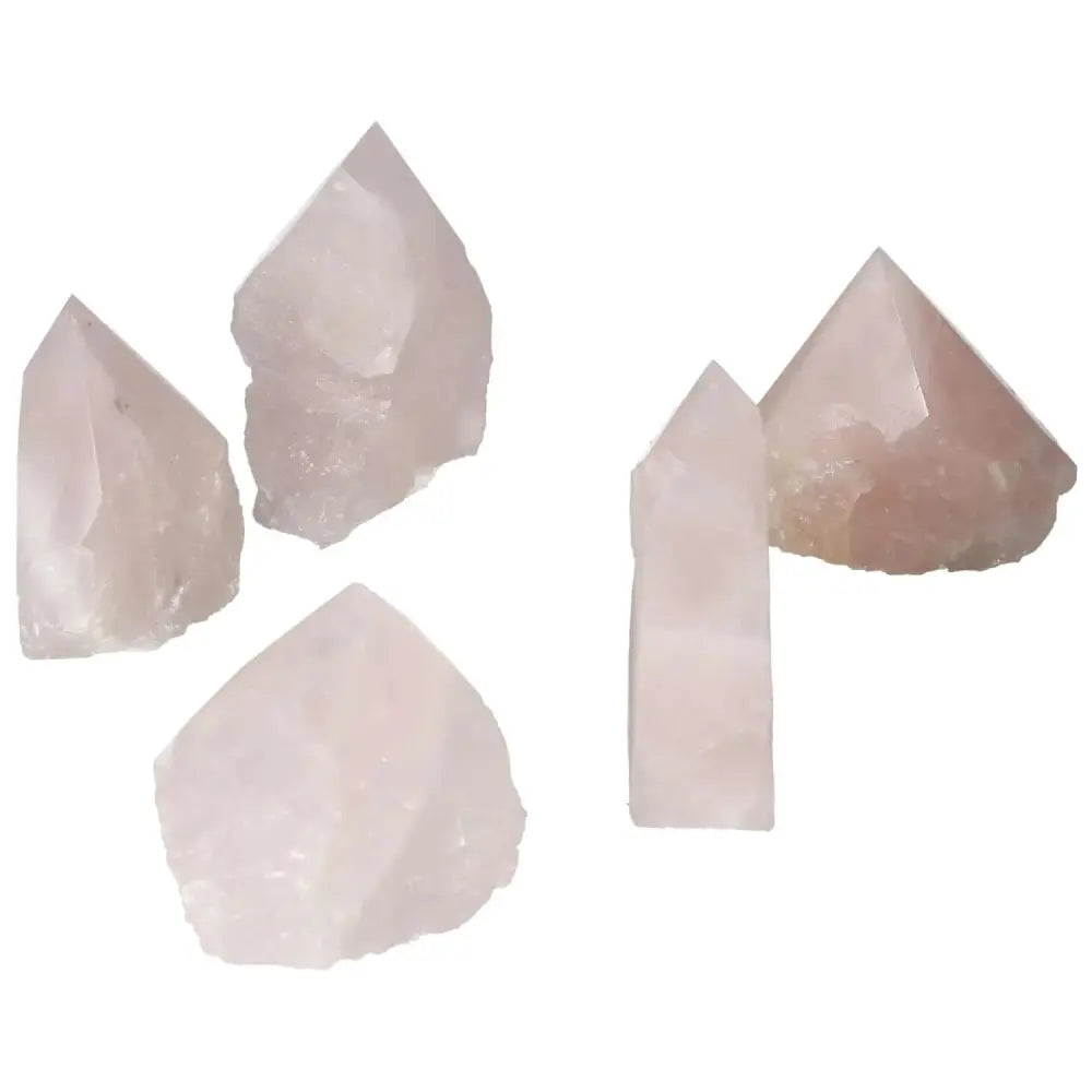 Polished Point Rose Quartz M - premium hand-selected crystals from Sylvia Crystals, enhancing peace and connection with calming energy.